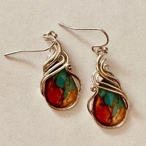 Elegant Silver and Red Dangle Earrings with Swirling Design
